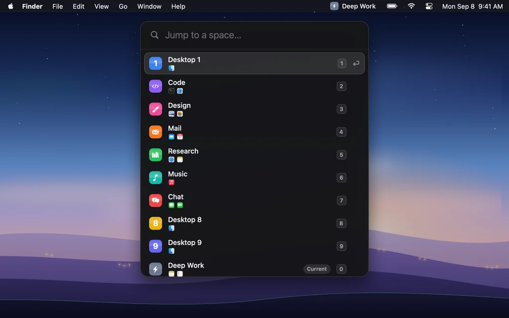 The Quick Switcher over a desktop: a search field reading Jump to a space above a list of desktops with numbered colored tiles.